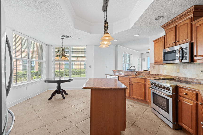Open Kitchen and Living Area at 230 N Serenata Blvd