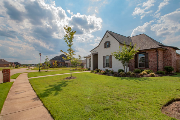 A house with a big front yard.