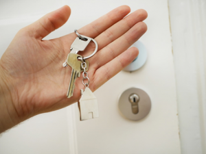 A homeowner holding their house keys.