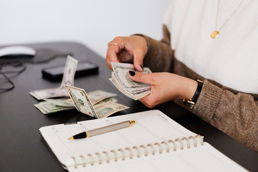 A girl counting her savings