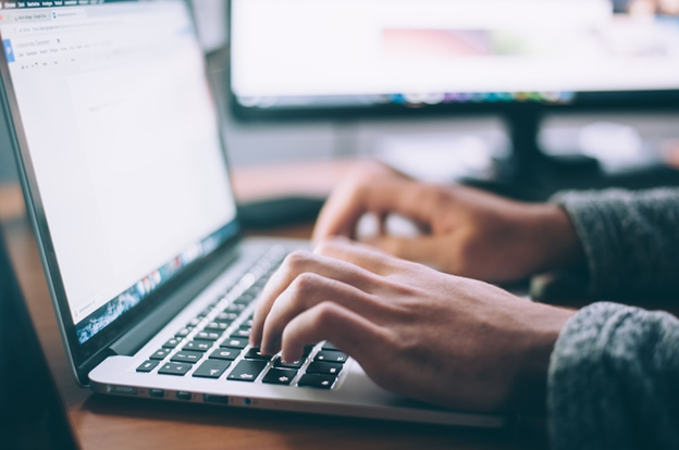 A person using a laptop.