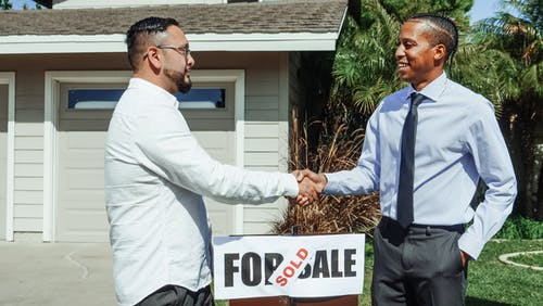 Man shaking hand with a real estate agent in Columbia