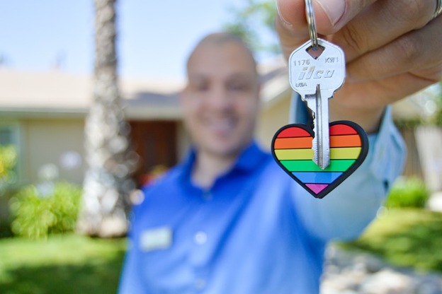 A person handing over house keys.