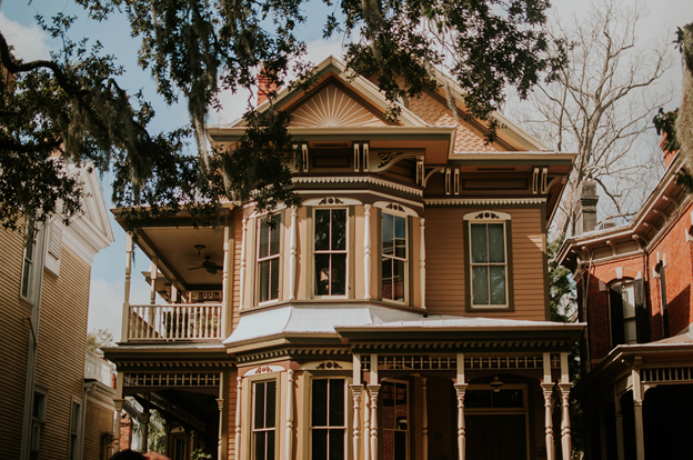 a beige 2-story house during daylight