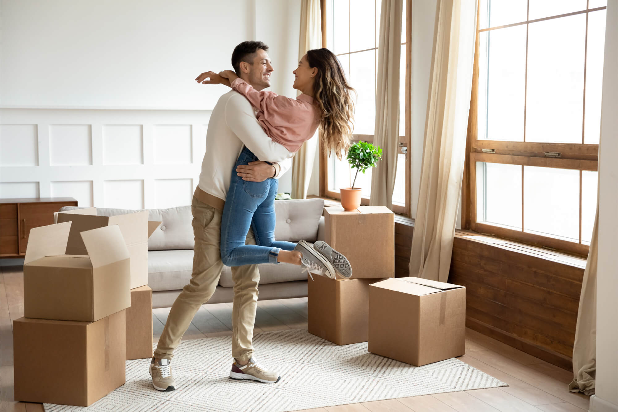 happy couple moving in