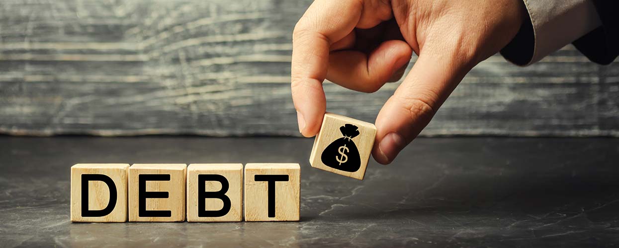 Debt concept showing high-interest loans as a factor in rent vs buy home decision