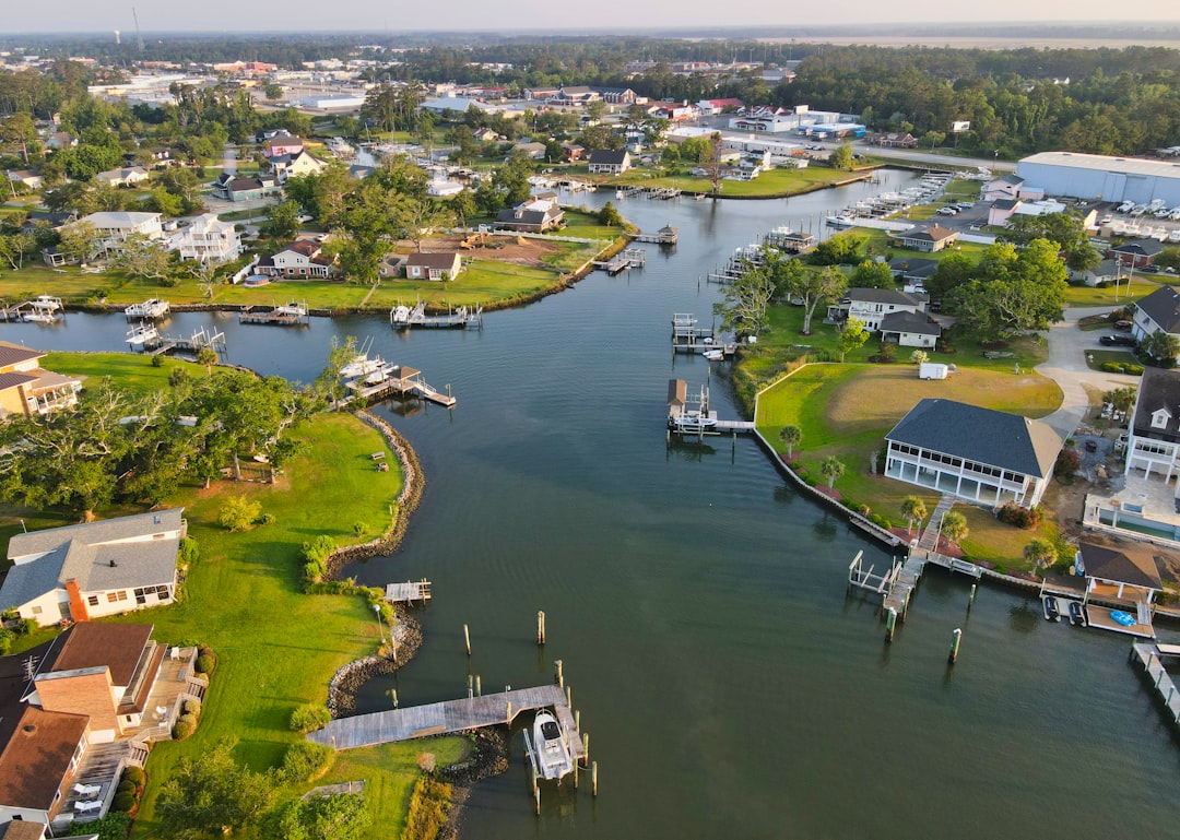 Aerial view of Morehead City waterfront homes with deep water boat access and private docks