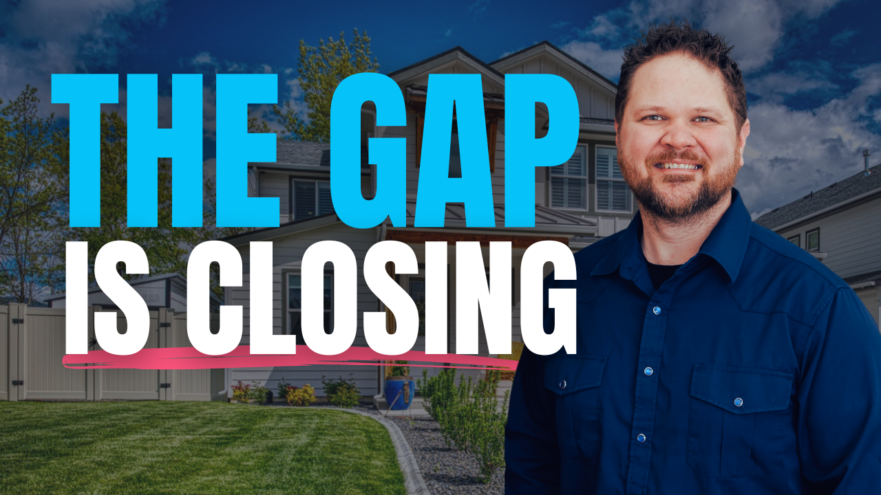 Ben Geanetta a sandpoint realtor with a house in the background with blue skys