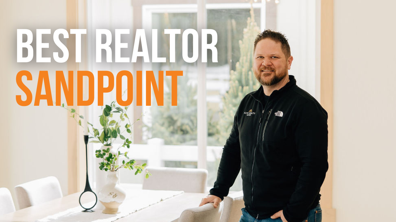 Ben Geanetta, Sandpoint realtor, standing by a table with decor