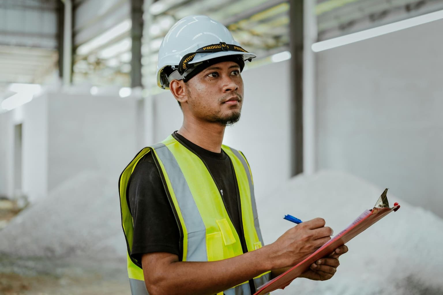 Contractor writing down house repair cost estimates