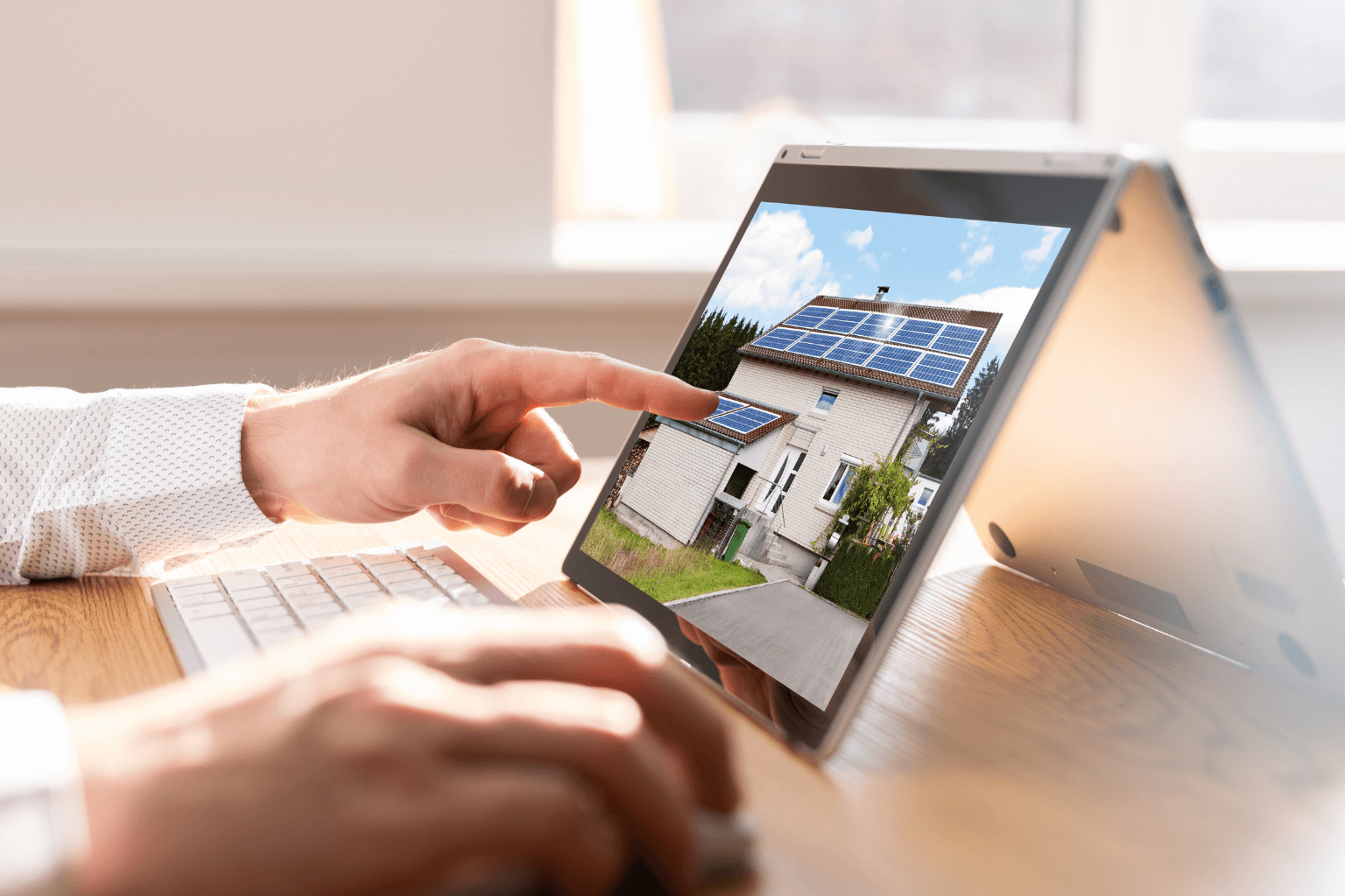 real estate listing of a fire-damaged home on a tablet screen