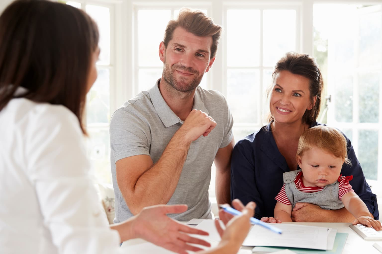 Homeowner discussing loan modification options with advisor