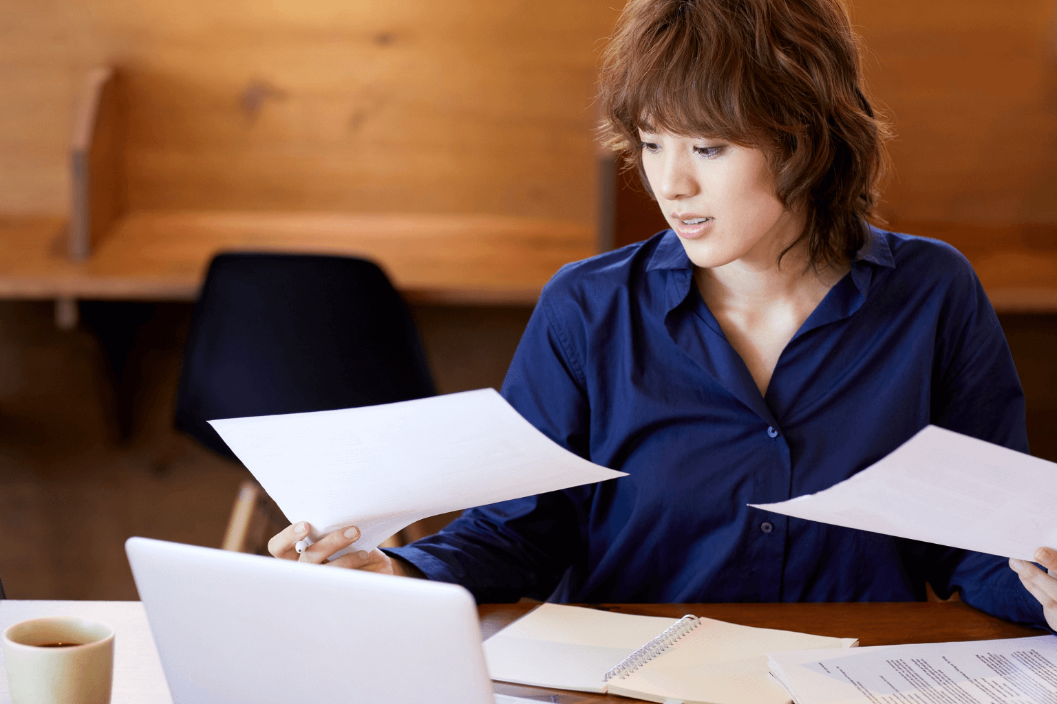Person reviewing a rental lease agreement