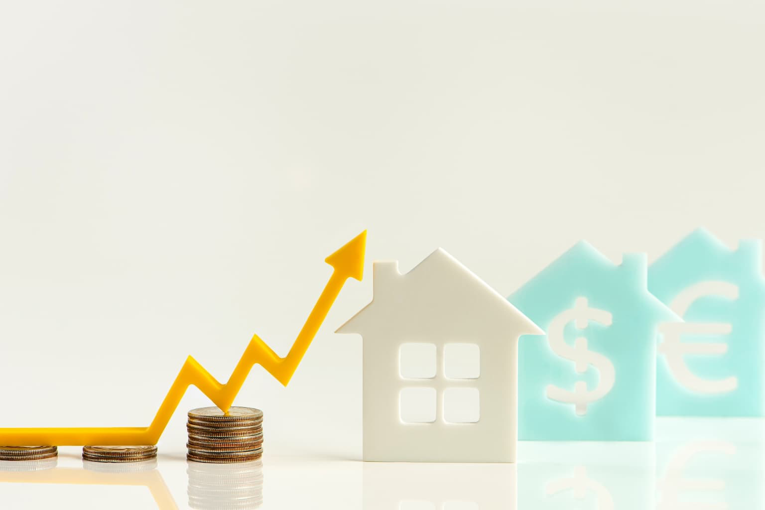 House model with rising property value sign to represent increase in basis after inheritance