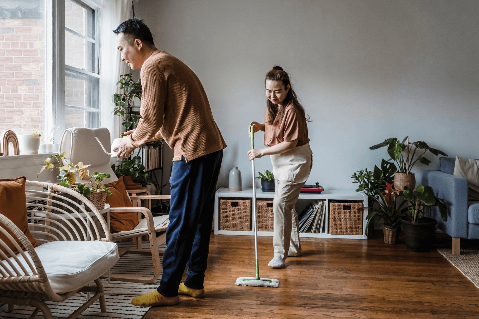 Tenant cleaning rental property before a showing