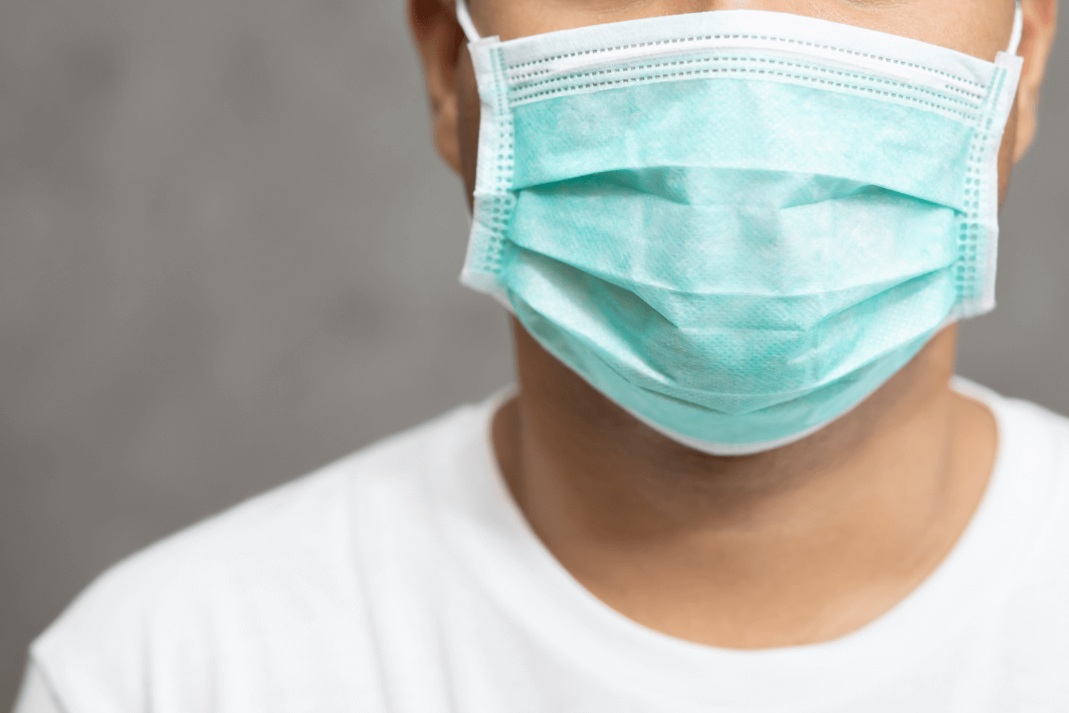 Person wearing protective mask for asbestos exposure