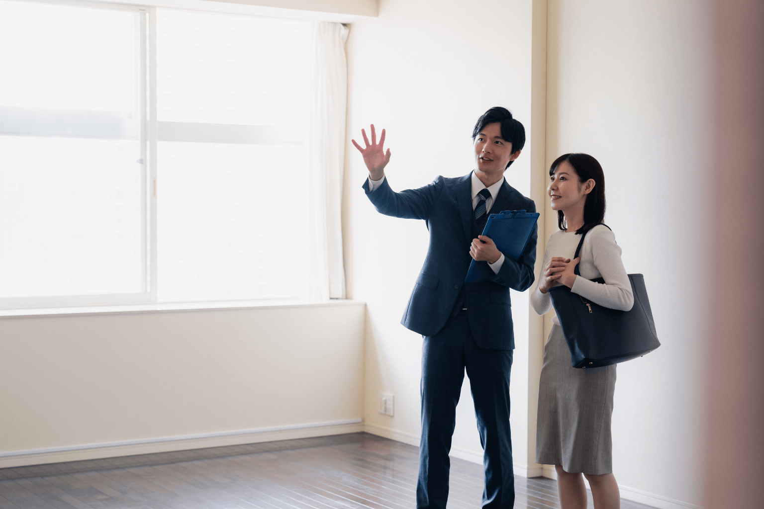 Cash buyer or investor viewing a property with clipboard