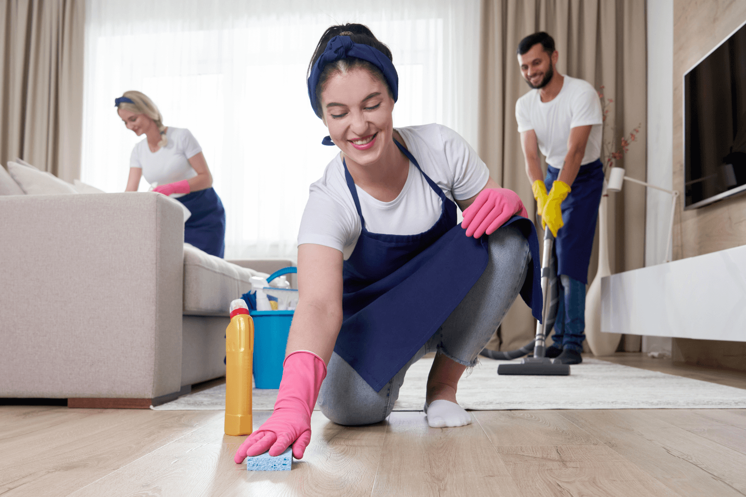 Professional cleanup crew working inside a messy house