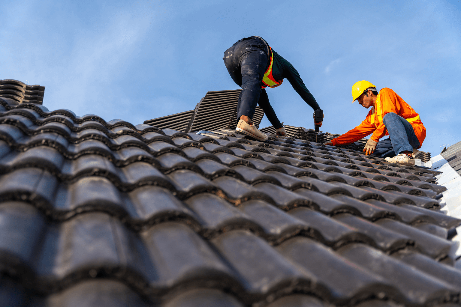 Contractor repairing a house before selling