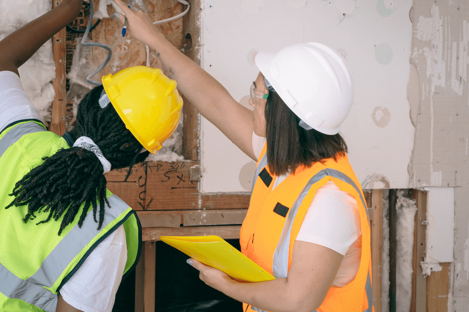 Licensed contractor inspecting a home for retroactive permits