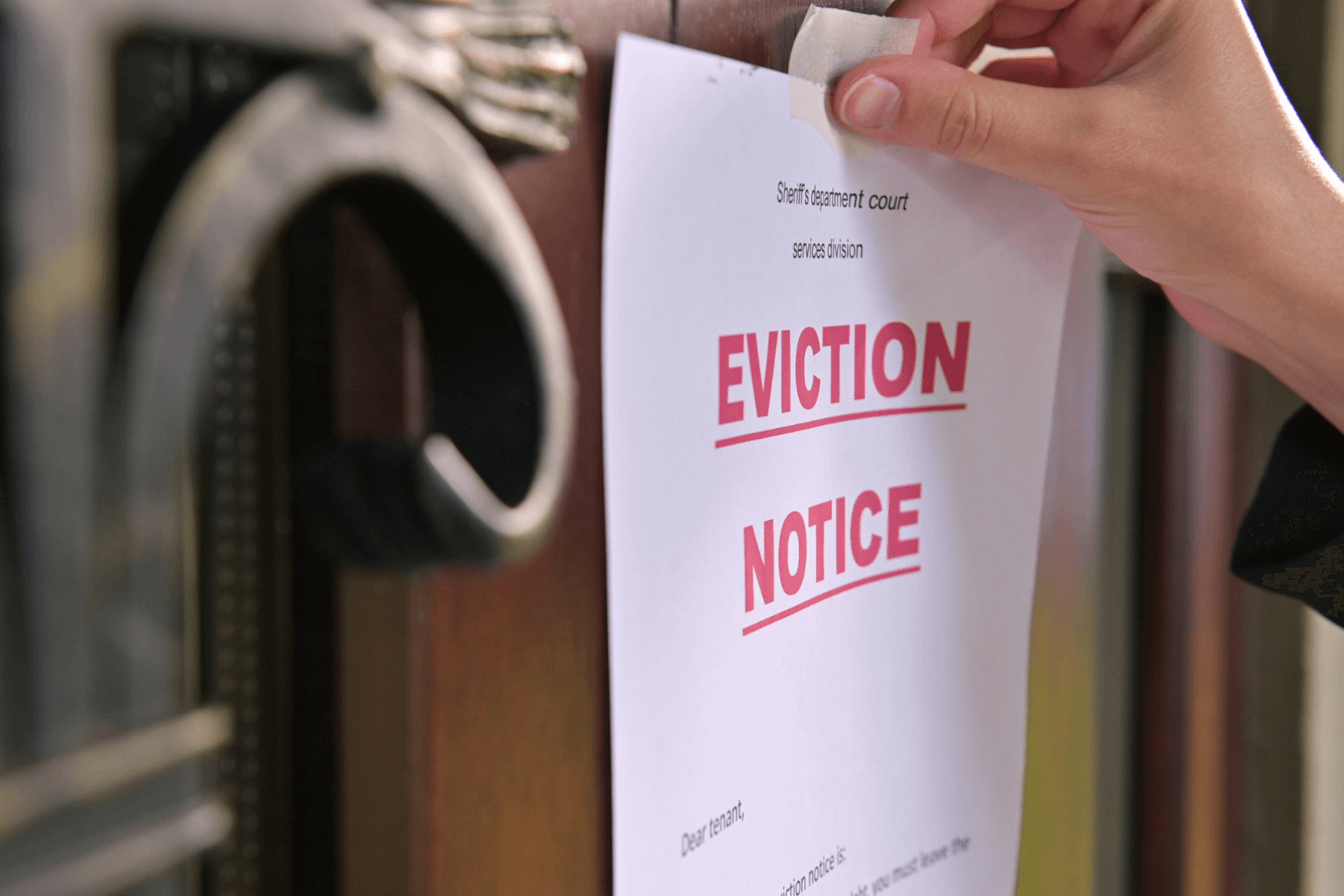 Eviction notice posted on a front door