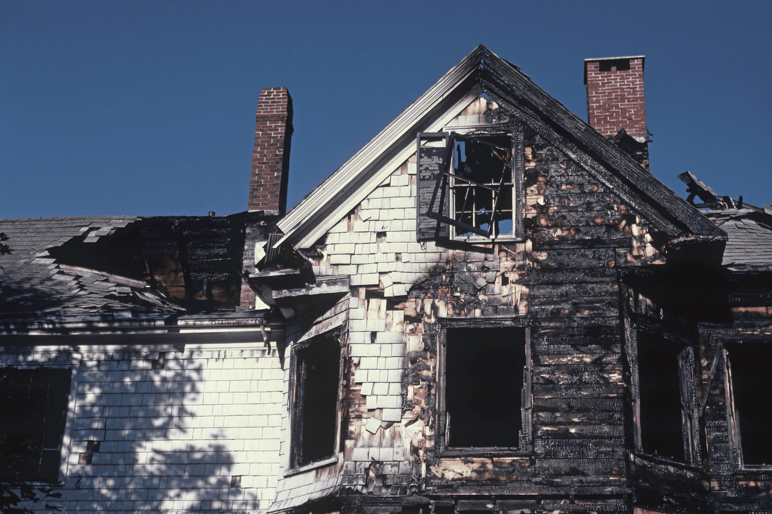 Fire-damaged home exterior in California