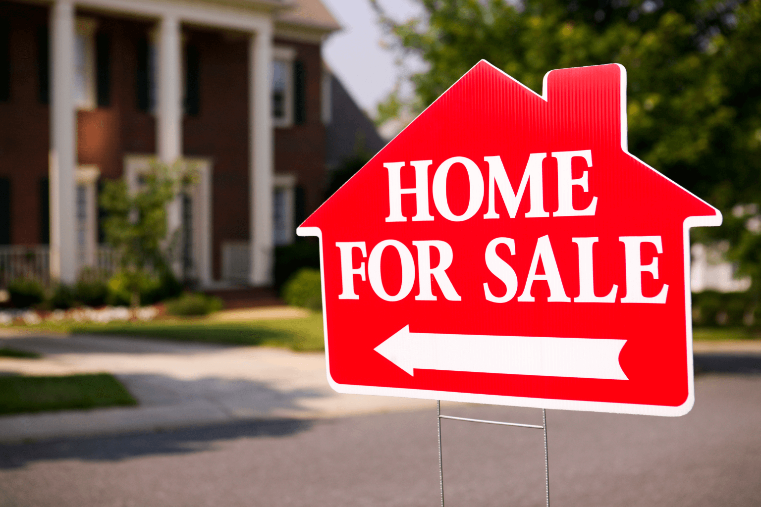For sale sign in front of cleaned-up California house