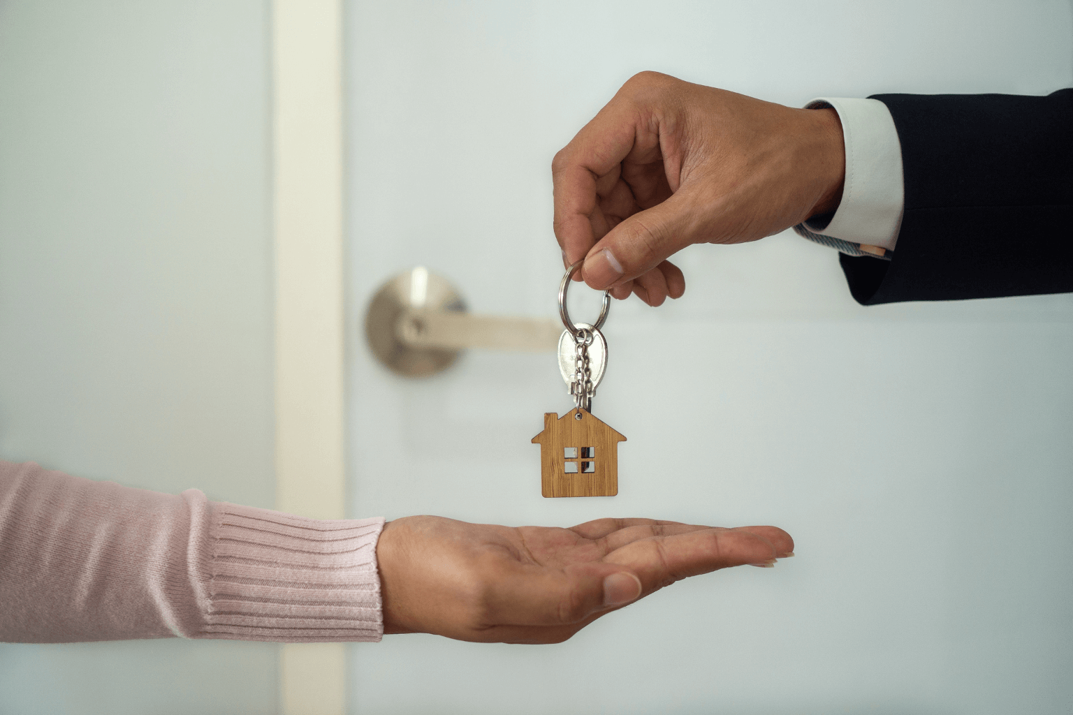 Buyer receiving house keys after probate sale