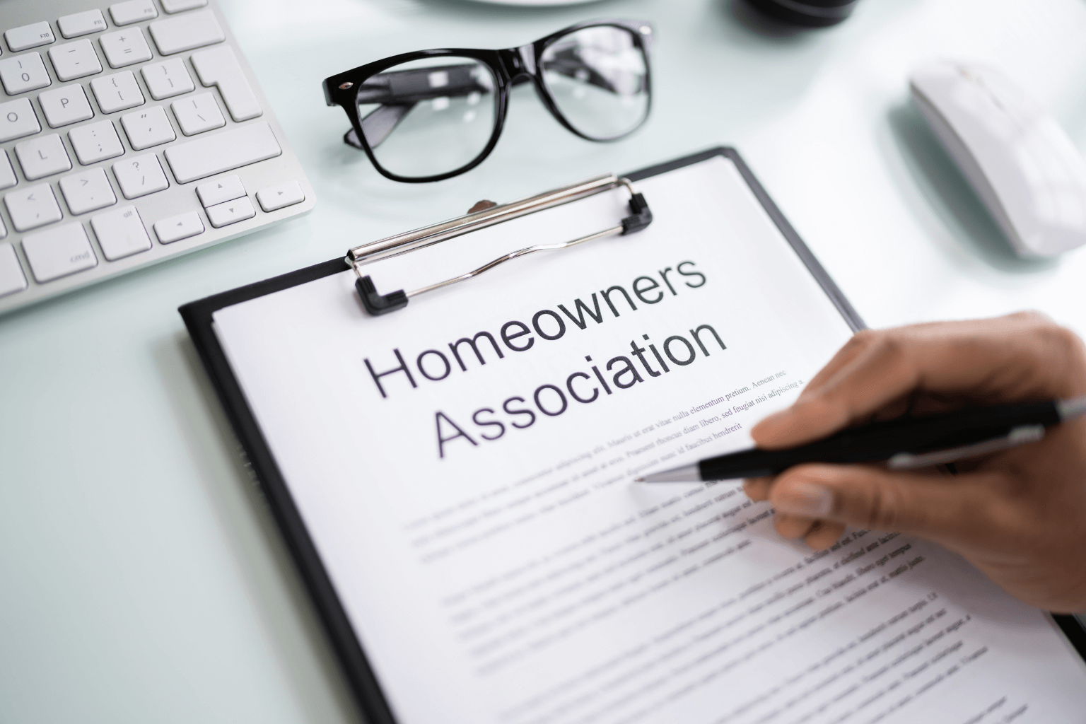 HOA lien paperwork on a desk