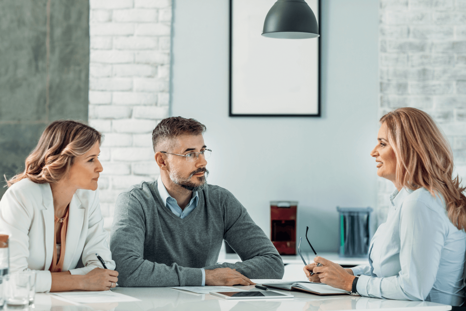 Homeowner discussing plans with a service professional