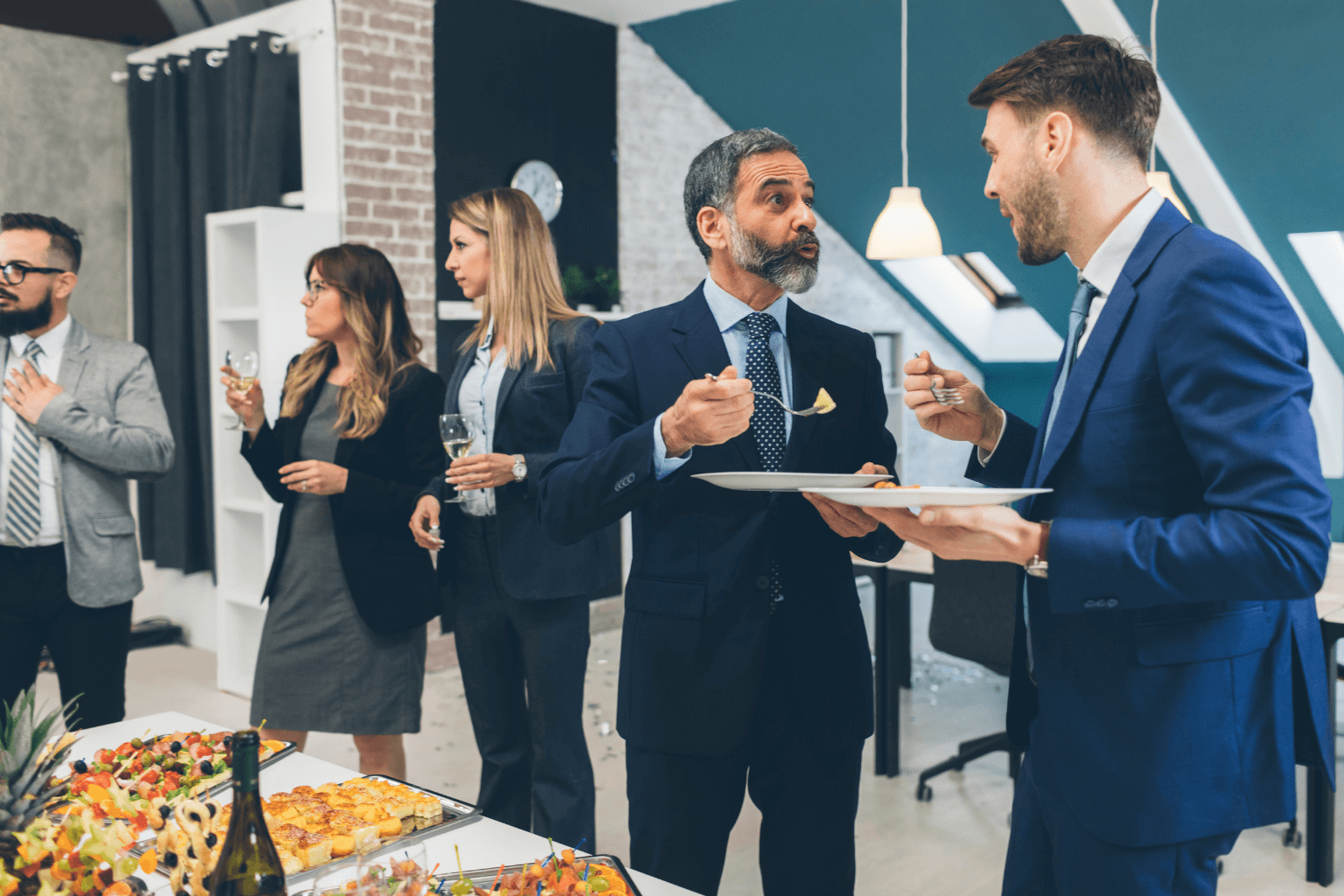 Real estate investors and contractors networking at an event