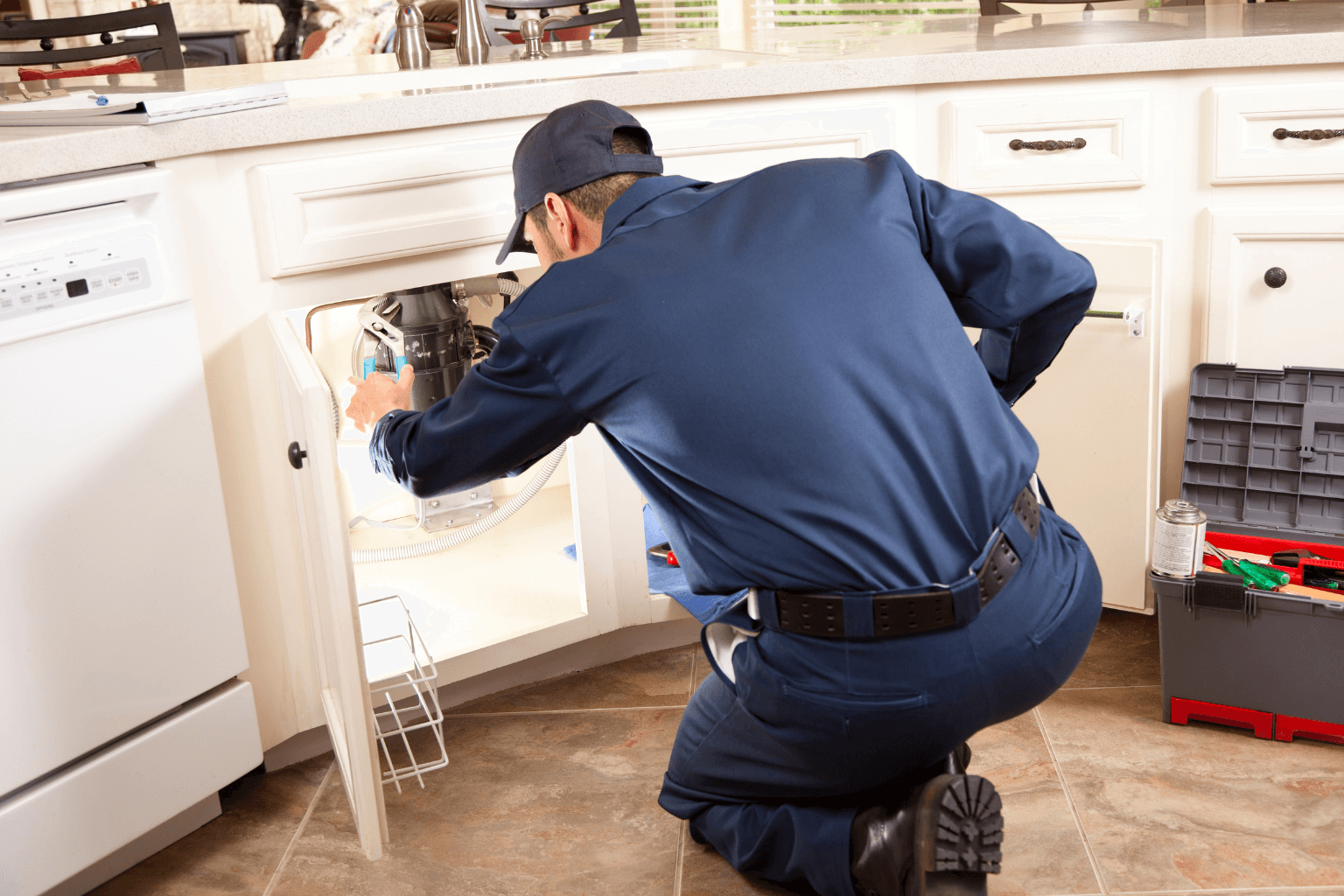 Home inspector examining plumbing
