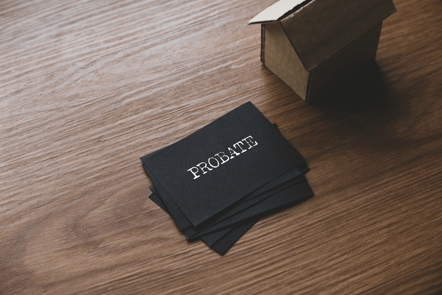 Stack of legal documents labeled probate process