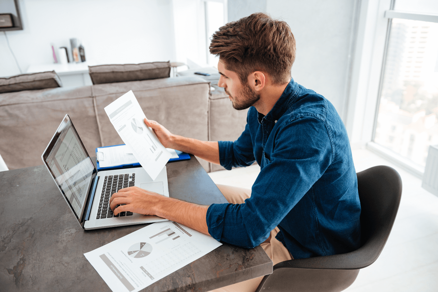 Real estate agent reviewing market trends