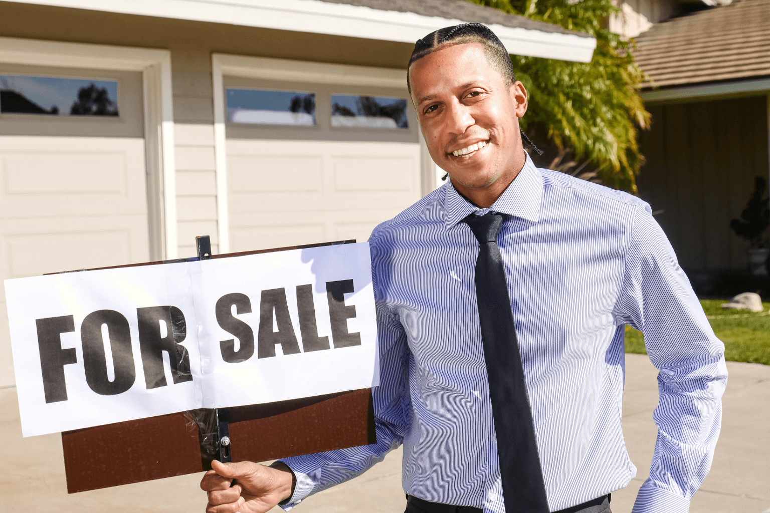 Occupied rental house with for sale sign in front yard