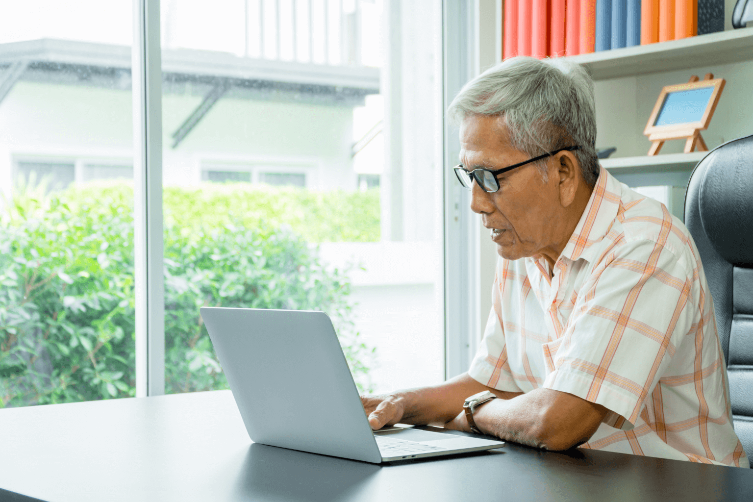 Older adult reviewing alternatives to selling their home