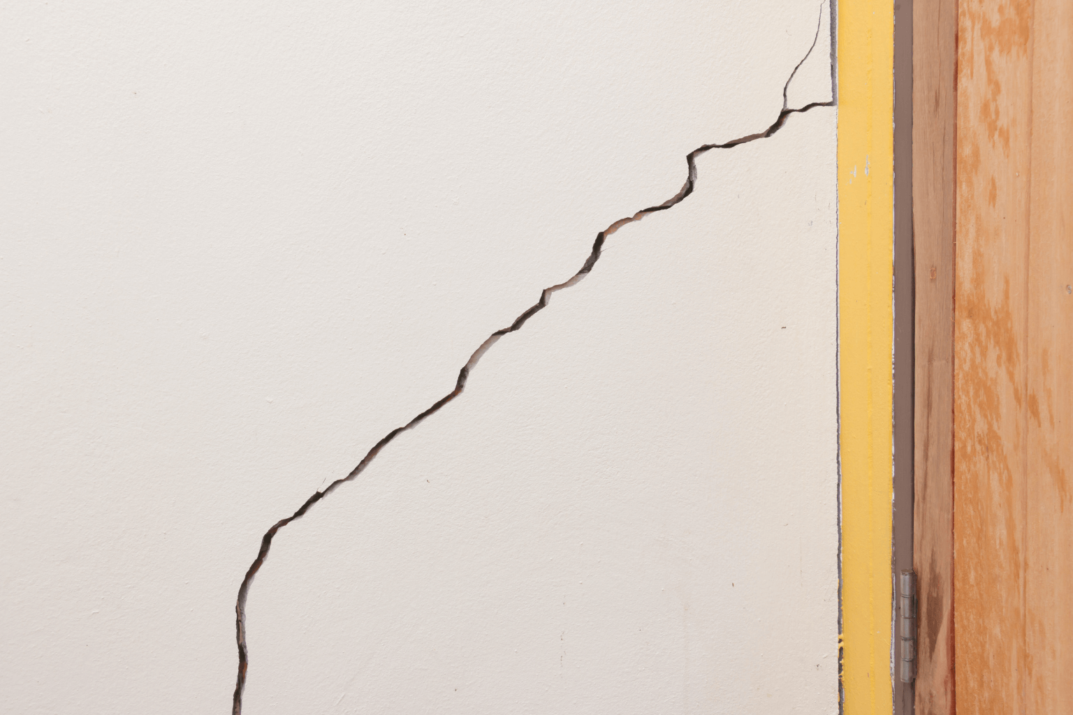 Selling a House with Foundation Issues Close up of cracked wall showing foundation problem