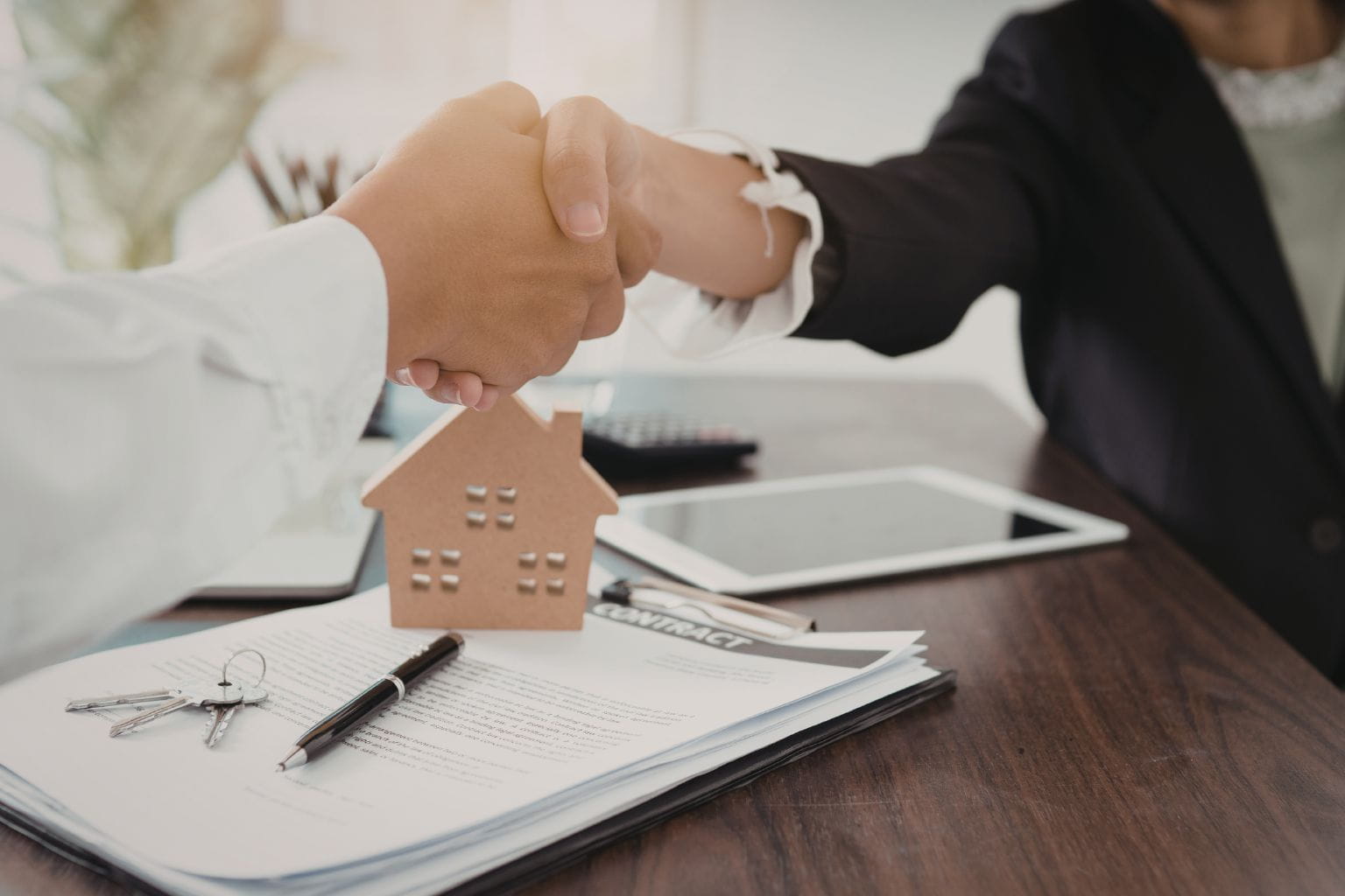 Sell a Home for Cash in the Bay Area Buyer and seller shaking hands