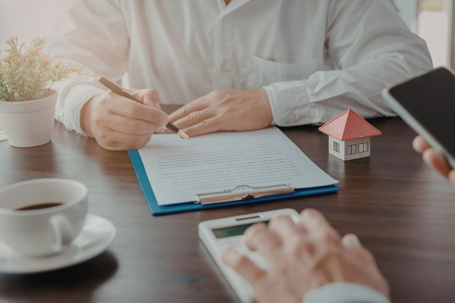 Seller signing paperwork