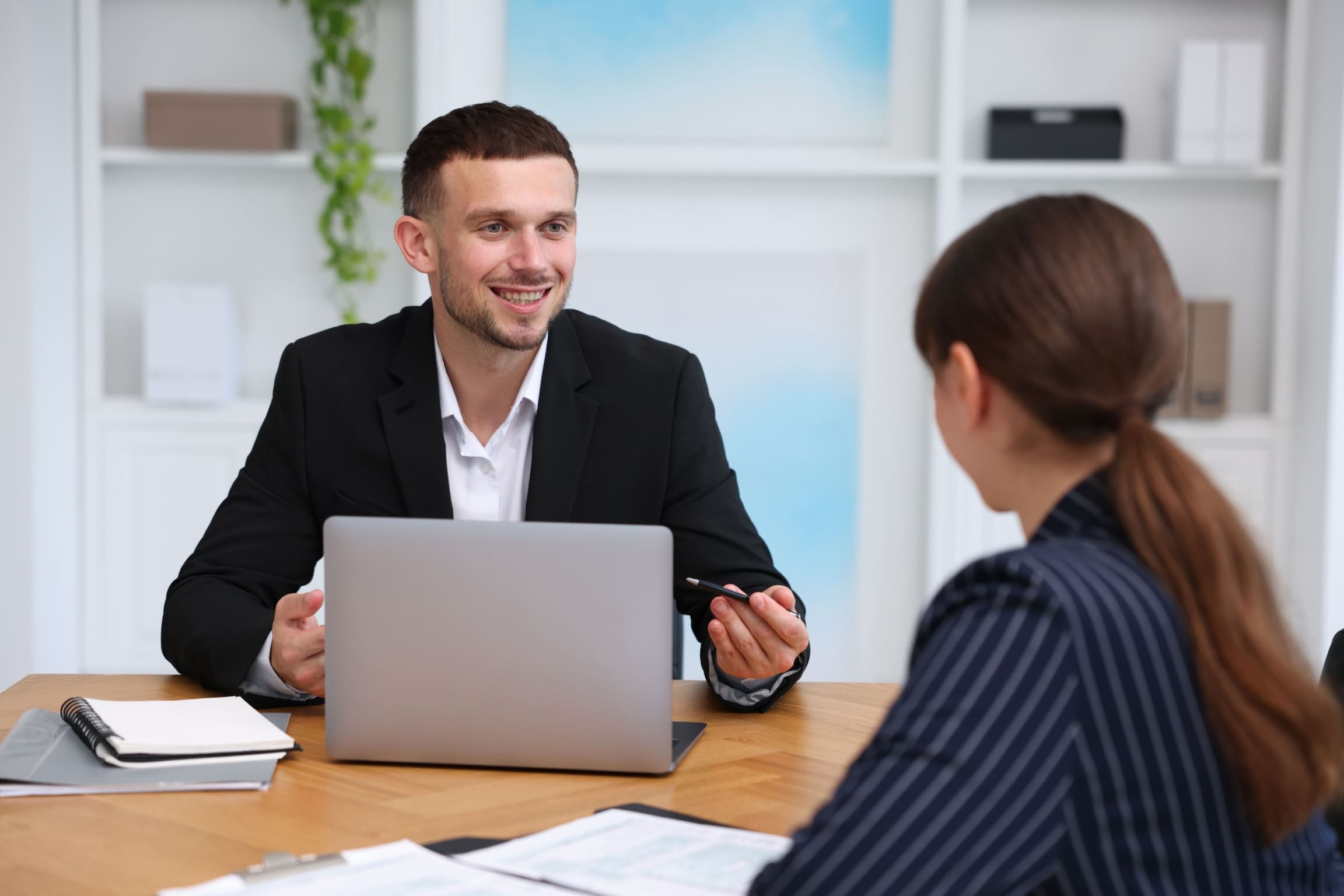 Real estate agent meeting with homeowner