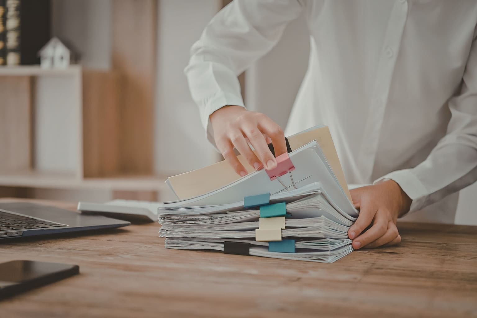 person organizing legal documents