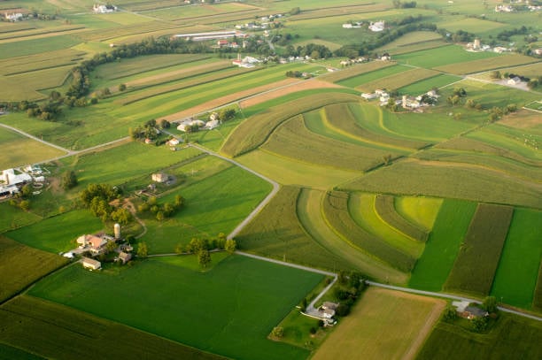 An aerial view of farm buildings and farmland in southern Lancaster County.
