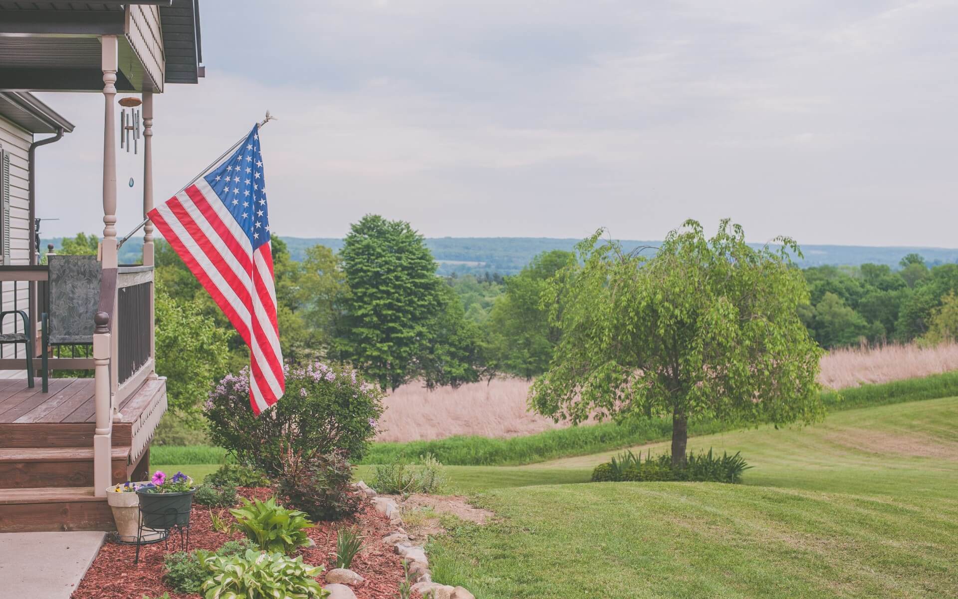 House front view, USA flag