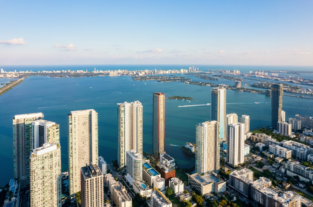 Edgewater is emerging as one of Miami’s most desirable bayfront neighborhoods, offering panoramic Biscayne Bay views, walkable green space, modern residences, and a quieter residential feel just minutes from Downtown and Brickell. Buyers are increasingly drawn to Edgewater for its balance of waterfront tranquility, urban access, and long-term value.