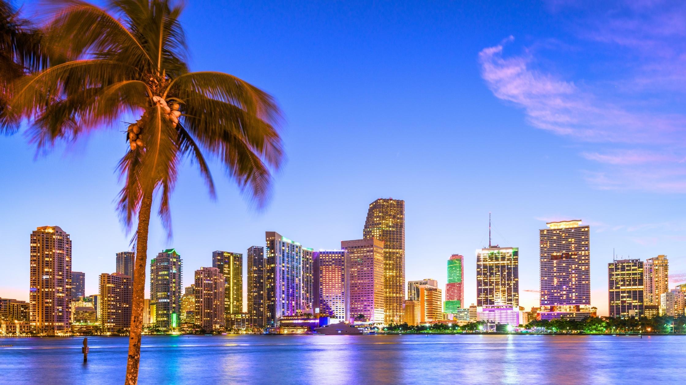 Aerial view of Miami showing Brickell, Coconut Grove, and Coral Gables neighborhoods side by side, the visual answer to which Miami neighborhood matches your old city.