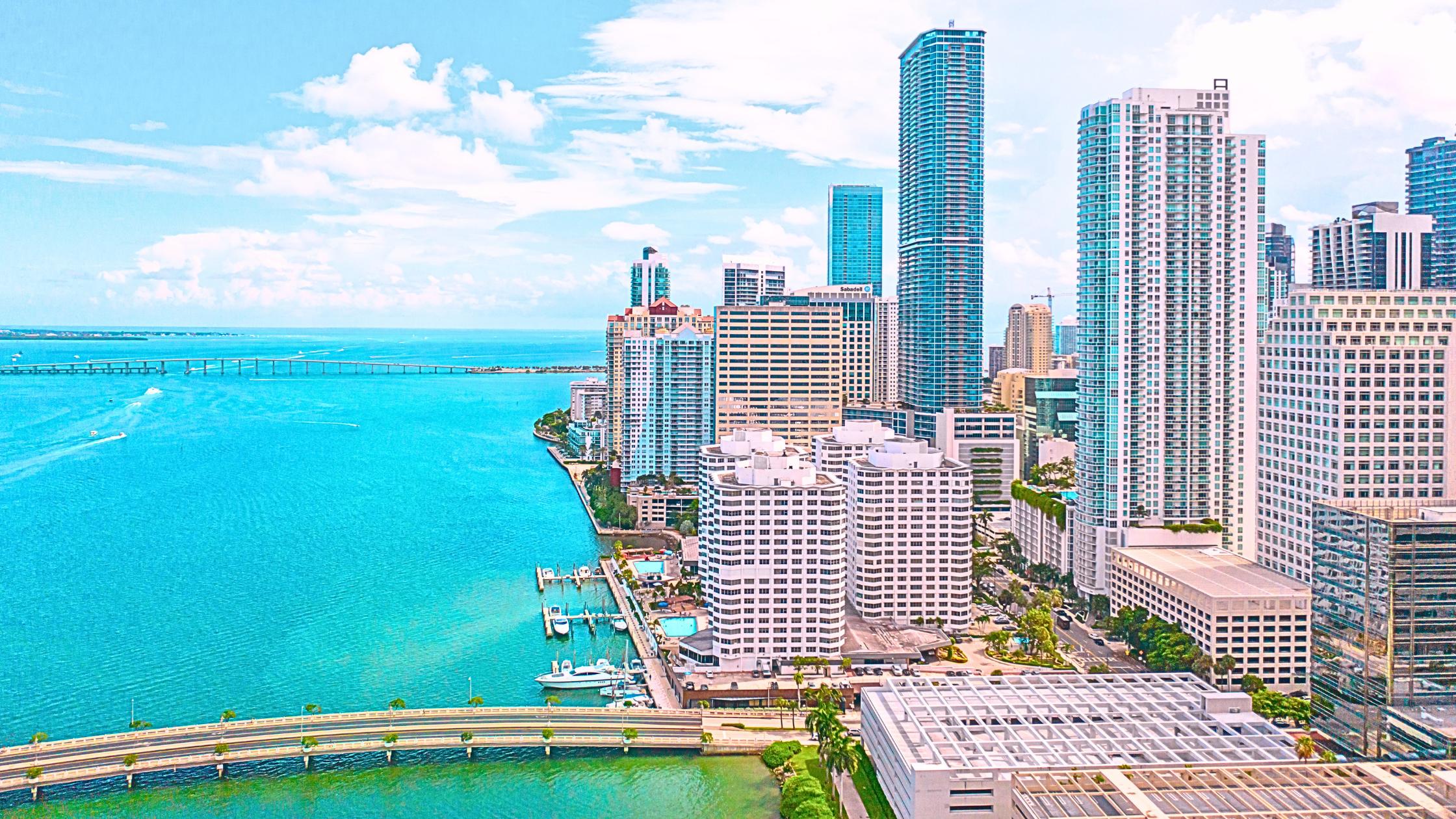 Aerial view of Brickell Miami skyline and Biscayne Bay showing the range of condo towers and waterfront homes in the 2026 luxury market