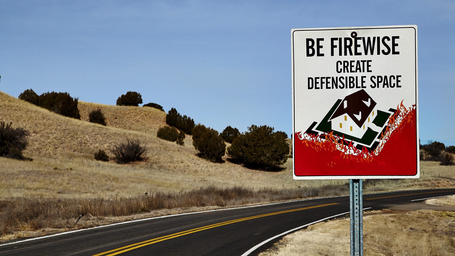 Be firewise road sign create defensible space