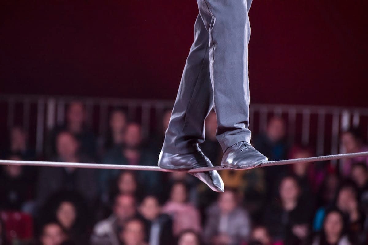 a-man-walks-in-a-rope-in-a-circu