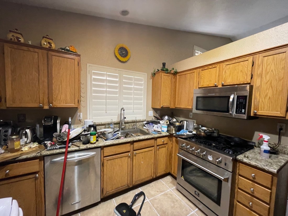 Kitchen before: counters covered