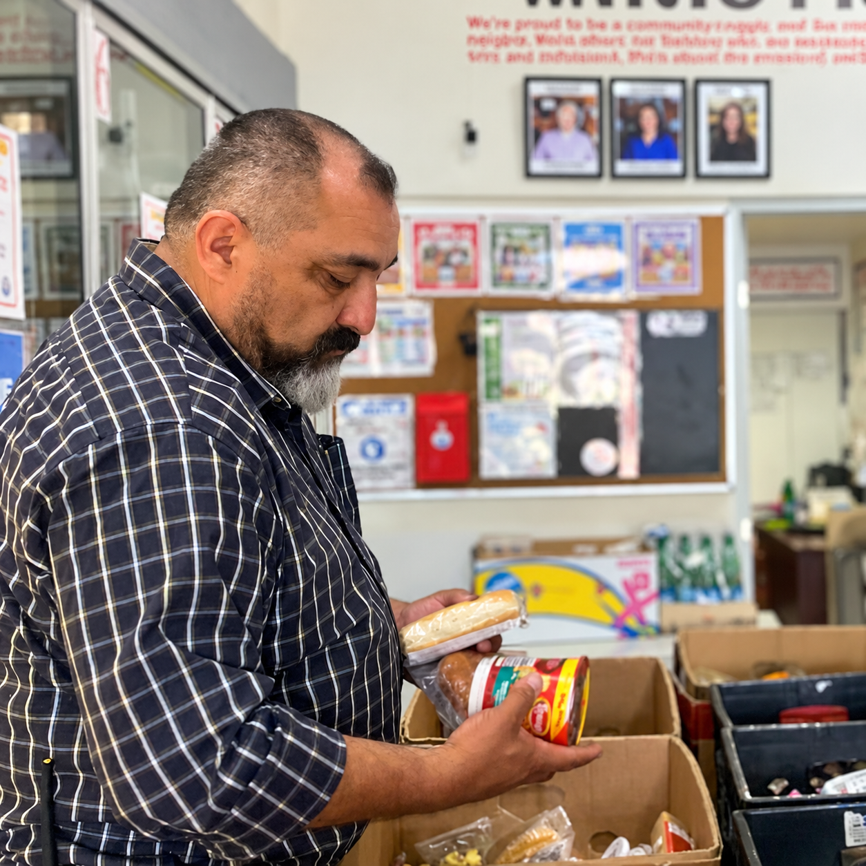 Community Pantry Volunteer Sorting Donations